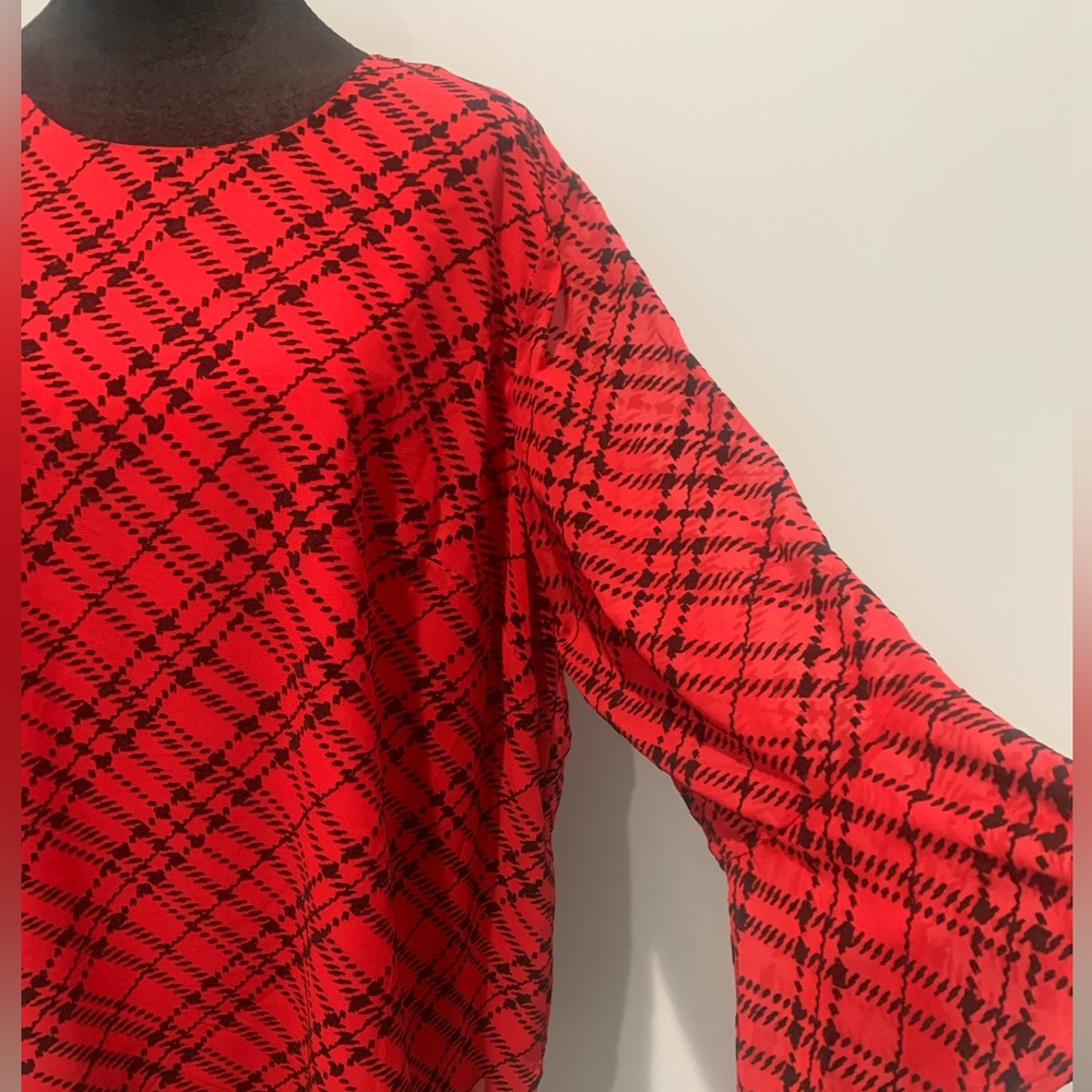 Calvin Klein red and black blouse with a bell sleeve